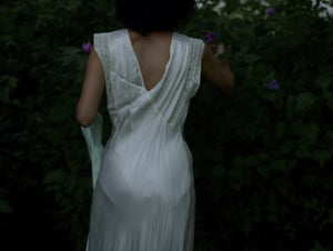 1930s cream satin full length bias cut slip dress with alencon lace trim and deep v back // fits up to large